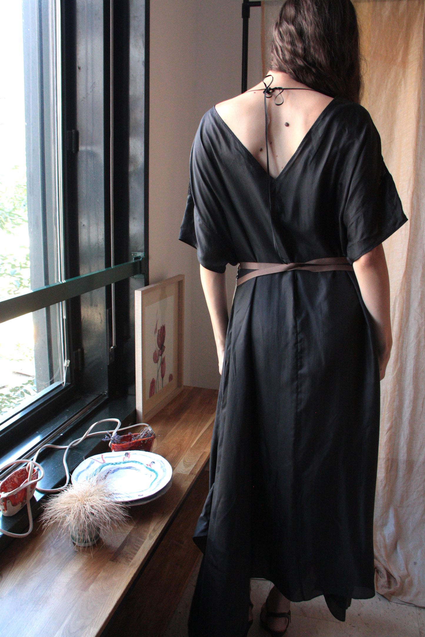 Long Black Silk Dress with “Winged Lion” Ornament